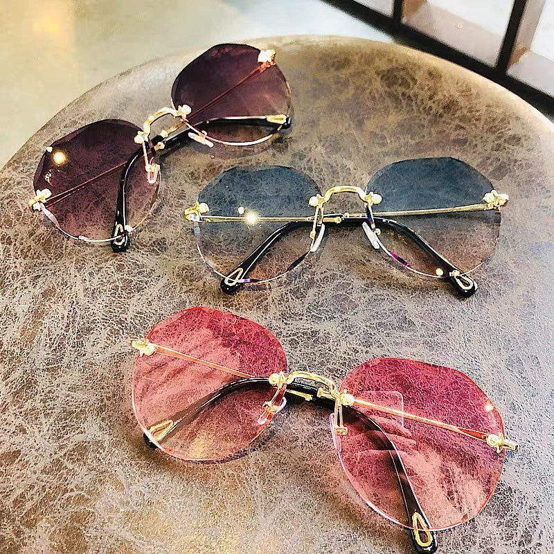 Vespera Polygonal Rimless Sunglasses